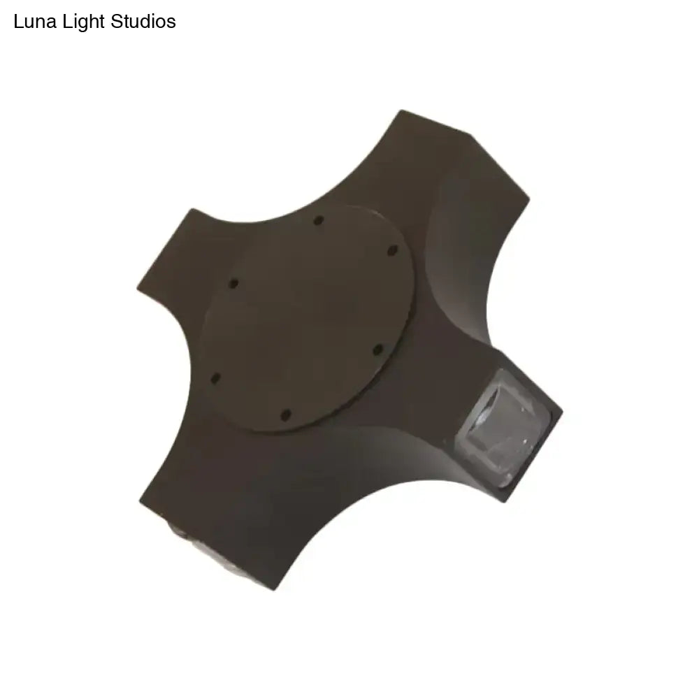 Dark brown four-armed outdoor corridor wall sconce with geometric metallic shade and clear lens for bedroom lighting
