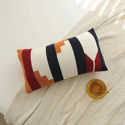 Rectangular knit cushion cover set with bold geometric stripes in cream navy rust and deep red for living room decor