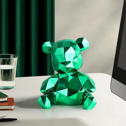 A vibrant green faceted electroplated teddy bear sculpture with a glossy geometric design for living room decor