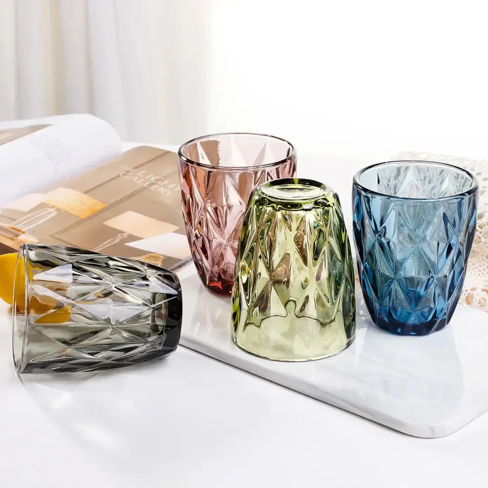 Set of four colorful faceted glass tumblers in pink green blue and gray 240ml water glass drinkware for dining