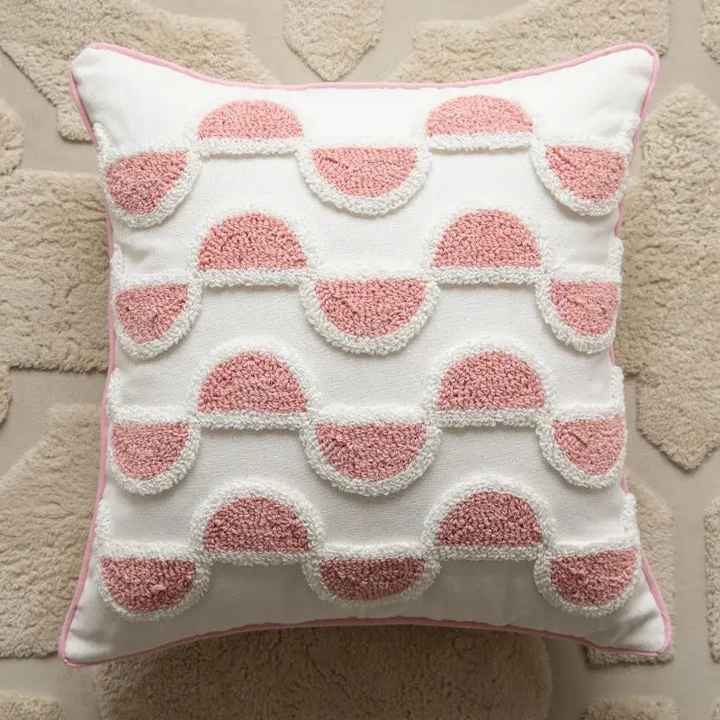 White throw pillow with textured pink half-moon pattern and piping for decorbites geometric embroidered cushion covers