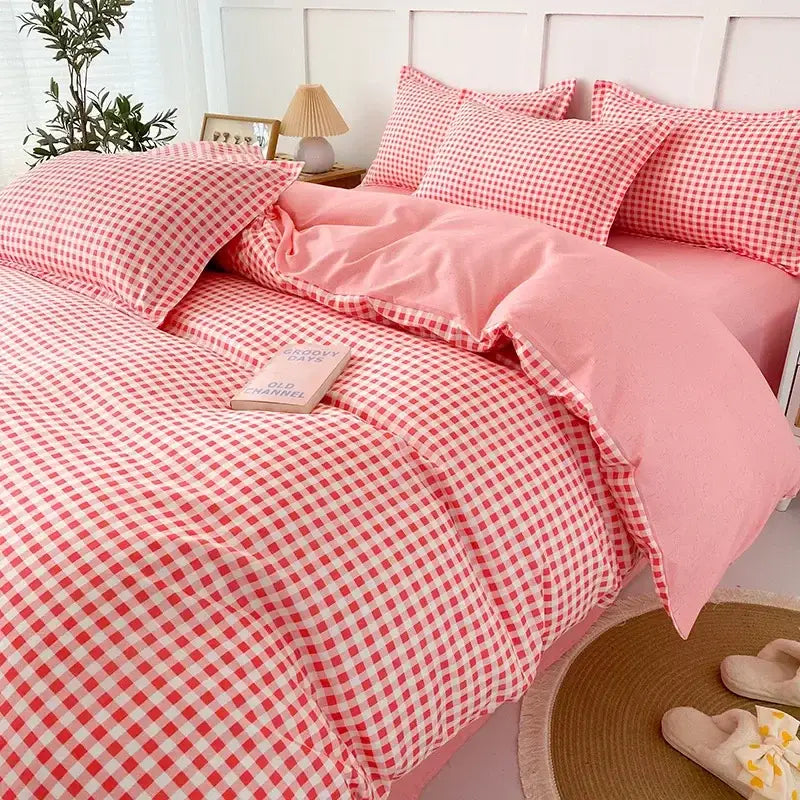 Pink and white gingham quilt cover set with ruffled edges for a stylish and cozy bedroom cover set