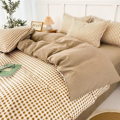 Beige and mustard yellow checkered quilt cover set with matching pillow sham for geometric pink and white gingham bedroom