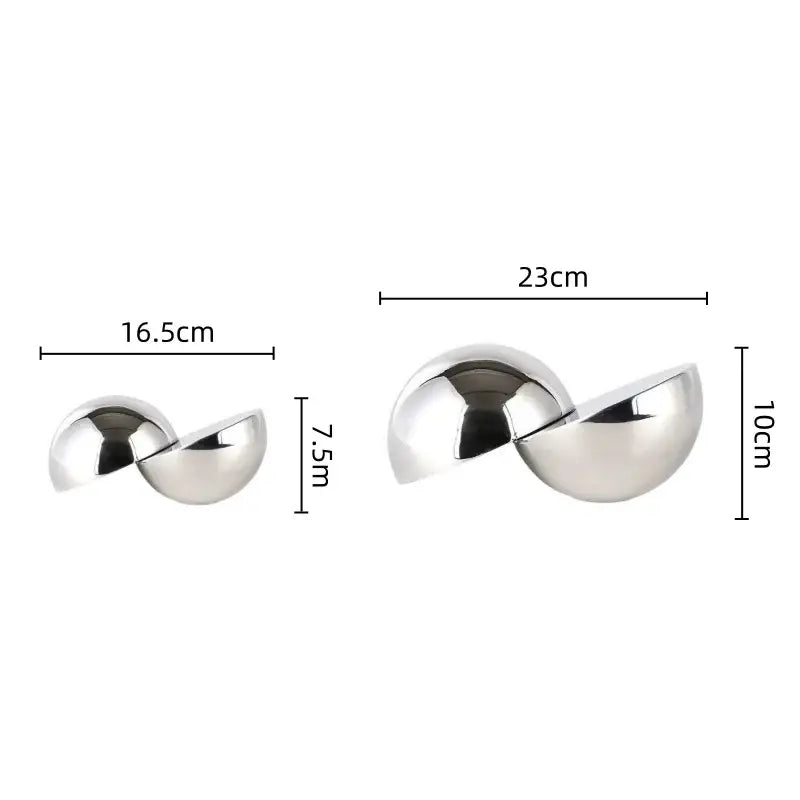 Two sleek interlocking silver metallic spheres home decor figurine in polished finish for living room decor