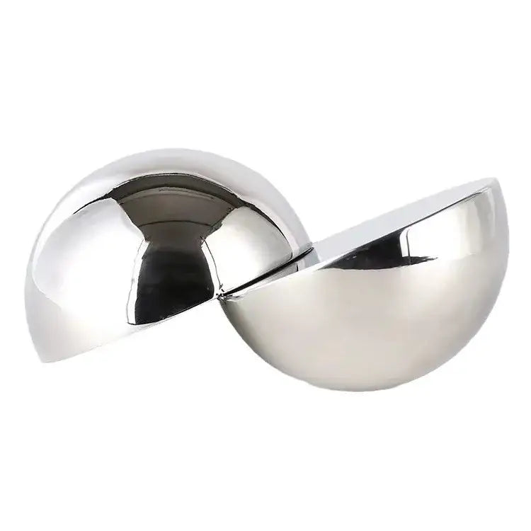Shiny chrome-finished half-sphere bowl home decor figurine with sleek modern design for living room display