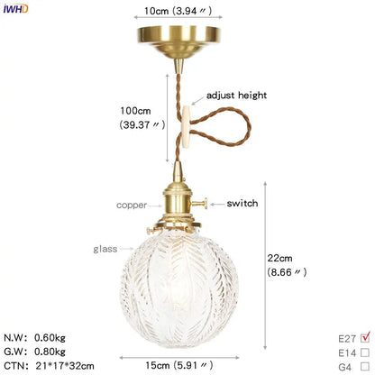 A vintage-style brass pendant light with clear etched glass globe and adjustable height cord for kitchen use copper led pendant
