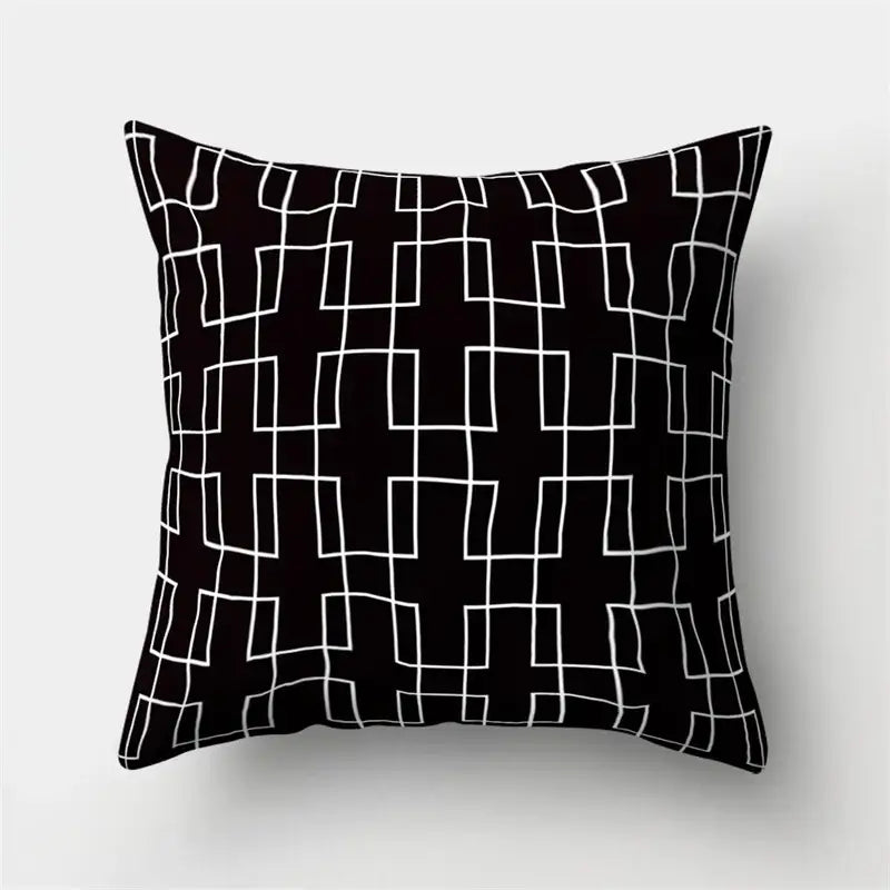 Black throw pillow cover with bold white geometric grid pattern for home decor by decorbites geometric star