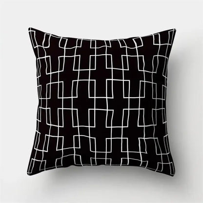 Black throw pillow cover with bold white geometric grid pattern for home decor by decorbites geometric star