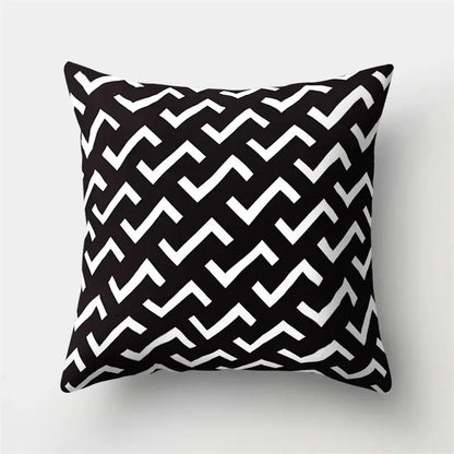 Black and white pillow cover with geometric star zigzag pattern for living room home decor by decorbites