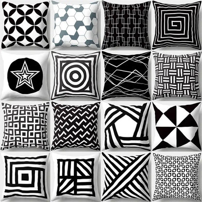 A collection of sixteen black and white geometric star print pillow covers on soft fabric for home decor by decorbites