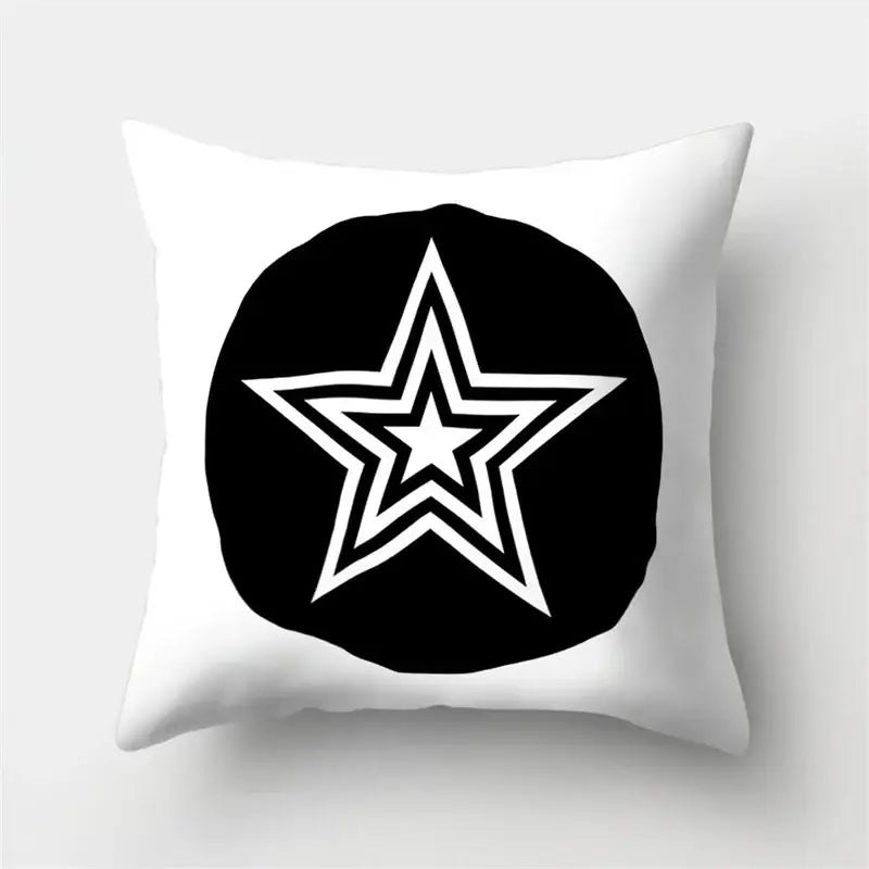 White throw pillow cover with bold black circular design and white star outline by decorbites geometric star for home decor