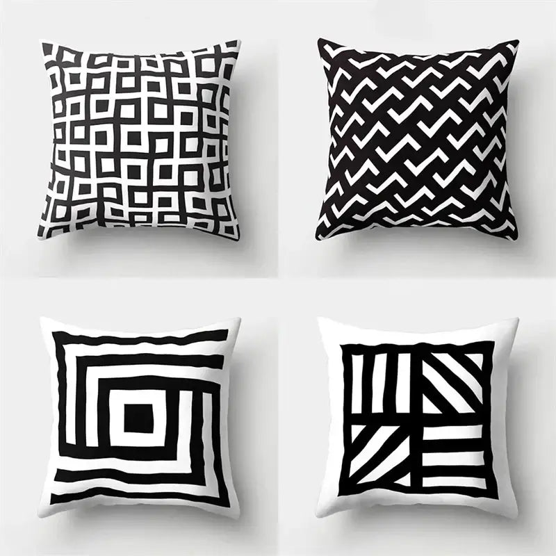 Set of four black and white pillow covers with decorbites geometric star print for stylish home decor