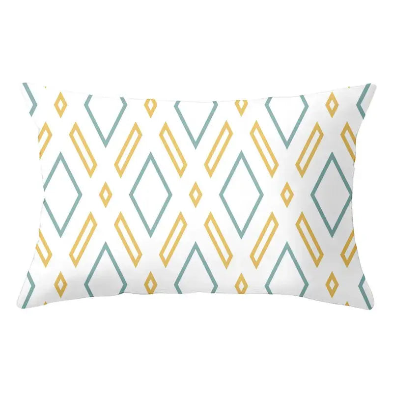 A geometric striped curved rectangle pillow in white with mustard yellow and sage green diamond outlines for living room decorbites geometric striped