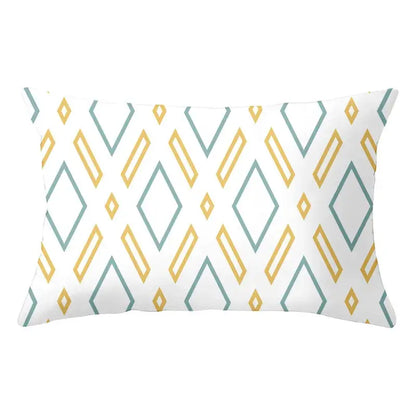 A geometric striped curved rectangle pillow in white with mustard yellow and sage green diamond outlines for living room decorbites geometric striped