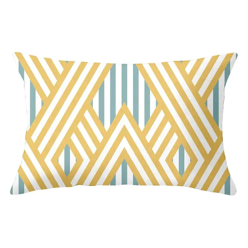 Rectangular pillow with a decorbites geometric striped pattern in yellow white and teal for living room decor