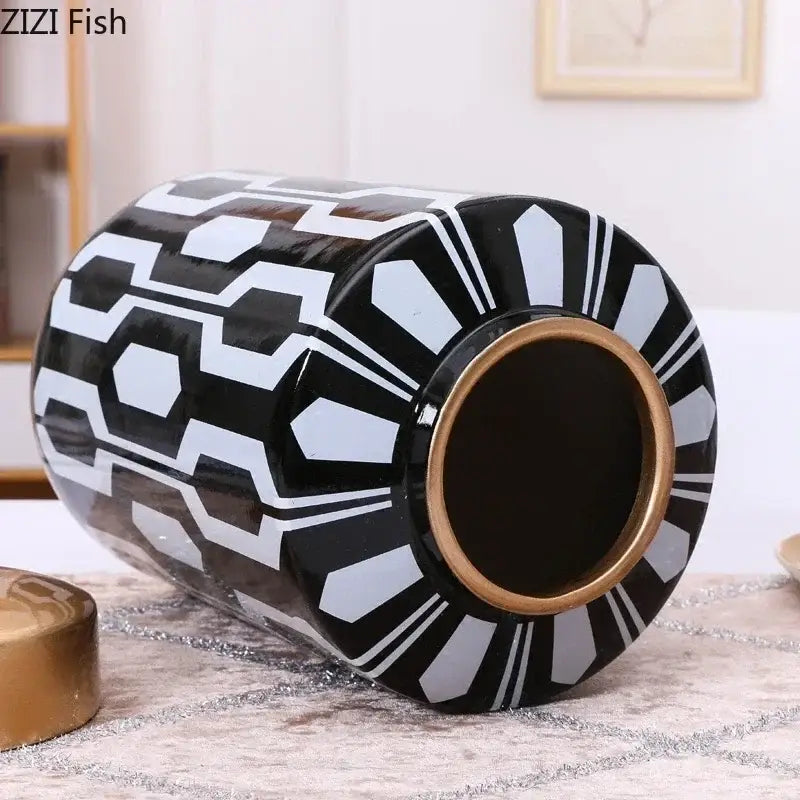 Black and white geometric stripes ceramic storage jar with gold toned rim for living room decor by decorbites geometric stripes