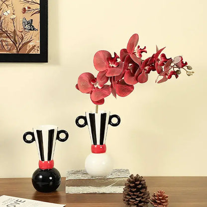 Geometric stripes black and white ceramic vase with red accents and handle-like ears for living room decor by decorbites geometric stripes ceramic