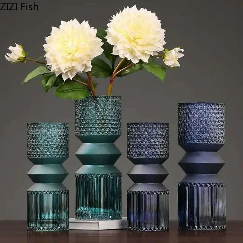 Set of four modern geometric teal and navy blue crystal clear glass vases with faceted decorbites design for living room decor
