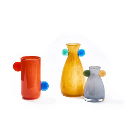 Vibrant decorbites geometric hand-blown glass vases in orange amber and gray with playful spherical handles for living room decor