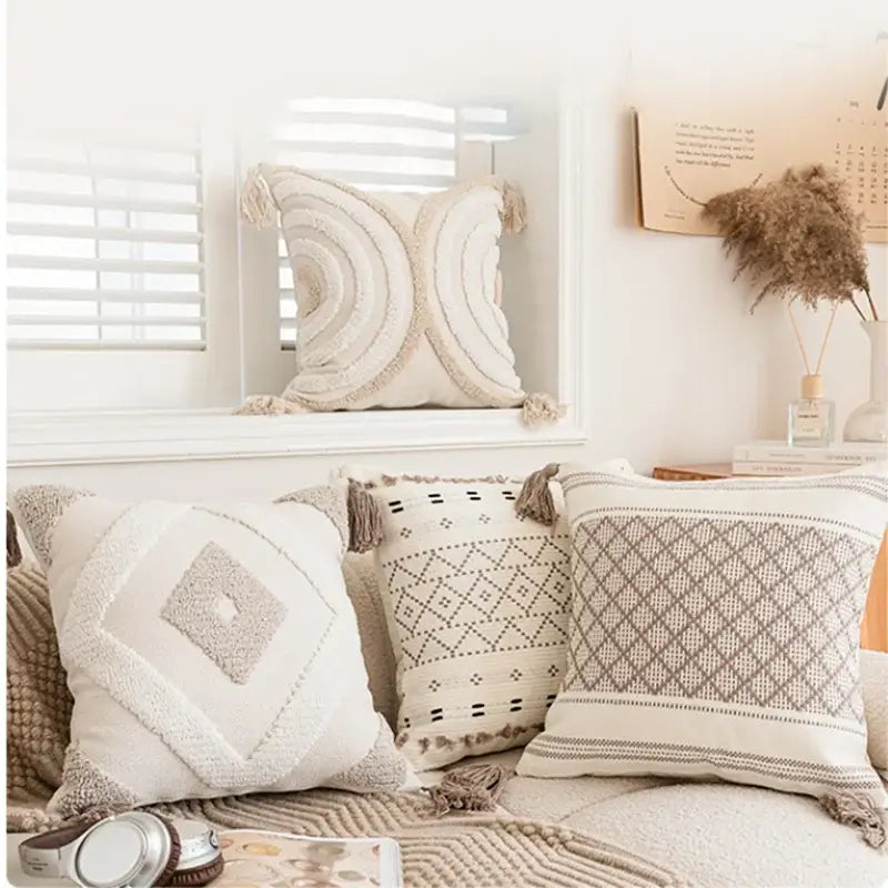 Beige and cream cushion cover with geometric tufted beige embroidery and tassel trim for living room decorbites decor