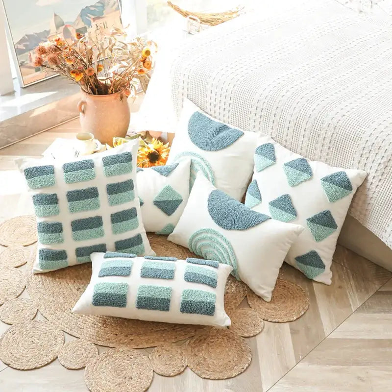 Set of pillow covers with geometric tufted diamond patterns in teal and white for cozy living room decorbites decor