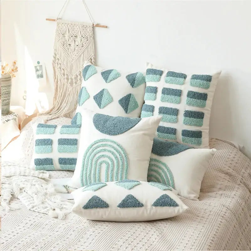 Set of decorbites geometric tufted diamond pillow covers in teal and white with textured fabric for living room decor
