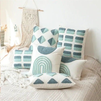 Set of decorbites geometric tufted diamond pillow covers in teal and white with textured fabric for living room decor