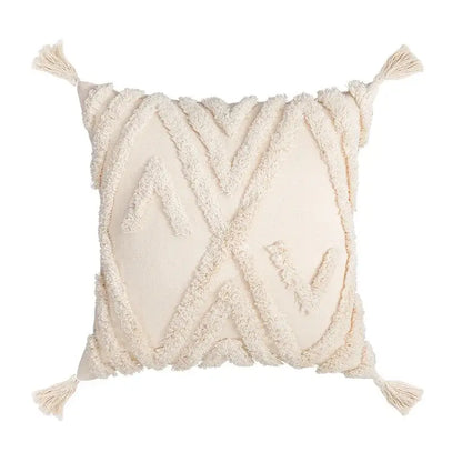Cream-colored cushion cover with decorbites geometric tufted fringed texture and tassels for living room decor