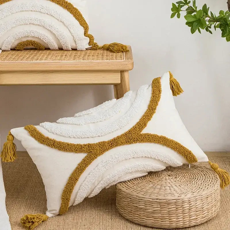 Cream-colored cushion cover with mustard-yellow tassels and geometric tufted plush embroidery for living room decorbites decor