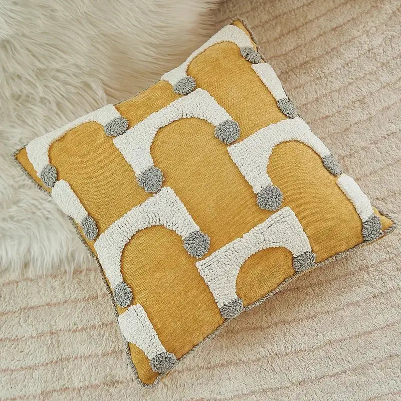 Mustard yellow cushion cover with cream and gray geometric tufted plush patterns for decorbites living room decor