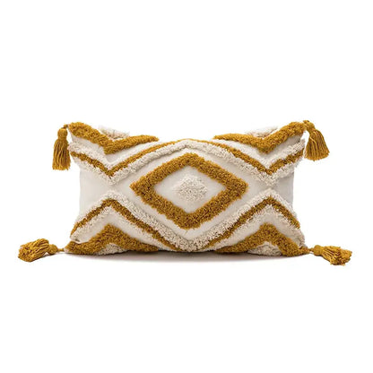 Cream-colored cushion cover with mustard-yellow geometric tufted plush embroidery and tassels for decorbites decor