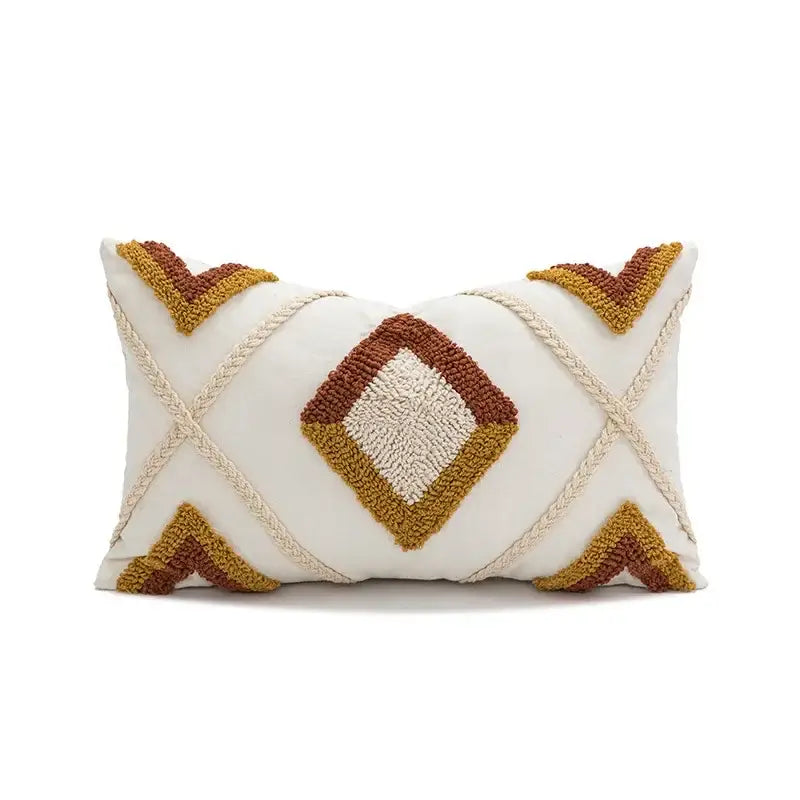 Cream-colored cushion cover with decorbites geometric tufted plush pattern in mustard and earthy brown tones for living room decor