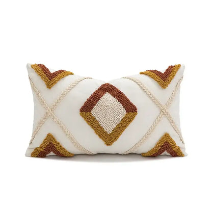 Cream-colored cushion cover with decorbites geometric tufted plush pattern in mustard and earthy brown tones for living room decor