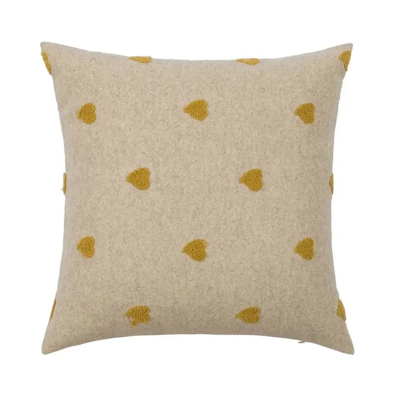 Beige cushion cover with mustard-yellow heart embroidery featuring decorbites geometric tufted plush design for living room decor