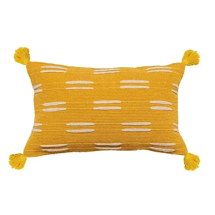 Mustard-yellow cushion cover with textured knit geometric tufted tassel design and white stripes for decorbites living room decor