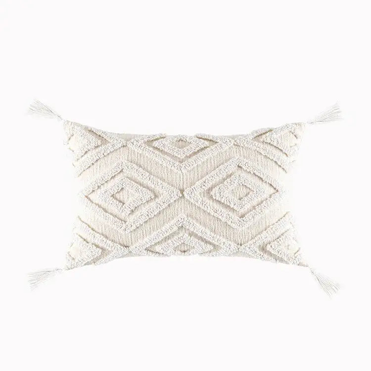 Cream-colored geometric tufted tassel cushion cover with textured pattern and tassels for beige and gray decorbites decor