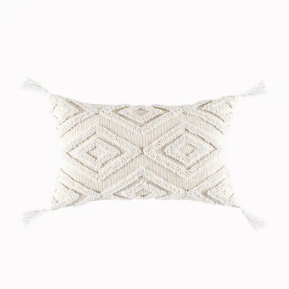 Cream-colored geometric tufted tassel cushion cover with textured pattern and tassels for beige and gray decorbites decor