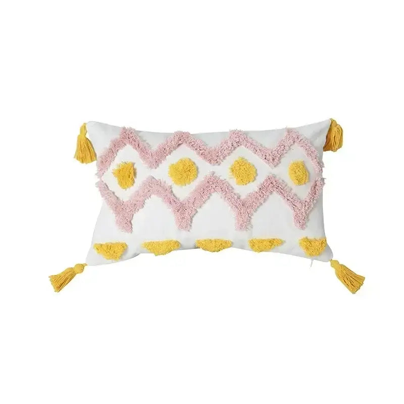 White rectangular cushion cover with textured pink and yellow geometric tufted tassel design for beige gray decorbites living room decor