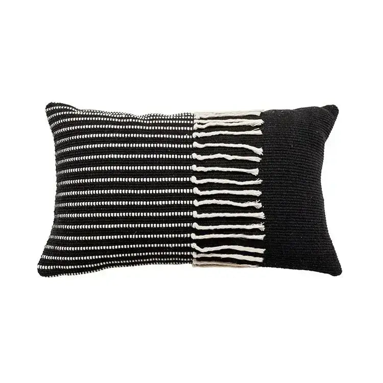 Black and white woven geometric tufted tassel cushion cover with textured knit pattern and tassels for living room decor
