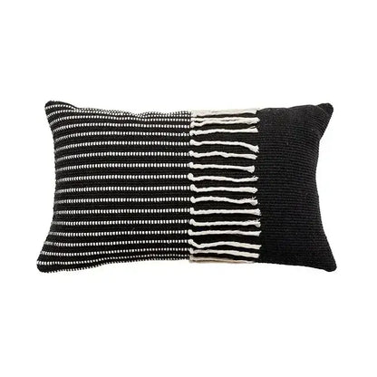 Black and white woven geometric tufted tassel cushion cover with textured knit pattern and tassels for living room decor