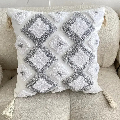 Beige cushion cover with colorful embroidered circular patterns and multicolored tassels for decorbites geometric tufted tassel decor