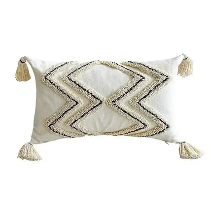 Cream-colored geometric tufted tassel cushion cover with black embroidery and tassels for beige and gray decorbites decor