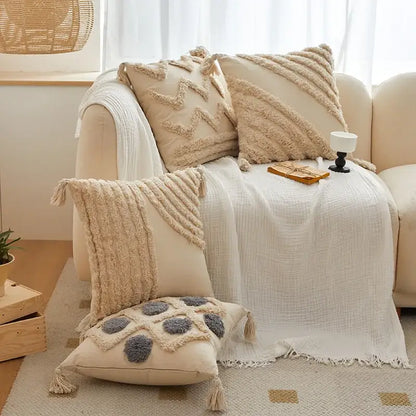 Beige textured cushion cover with geometric tufted tassel trim and embroidery for gray living room decorbites decor