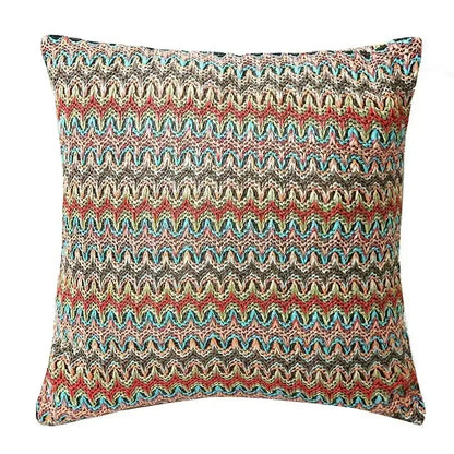 Multicolored woven cushion cover with geometric tufted tassel design in red blue beige and brown for living room decor