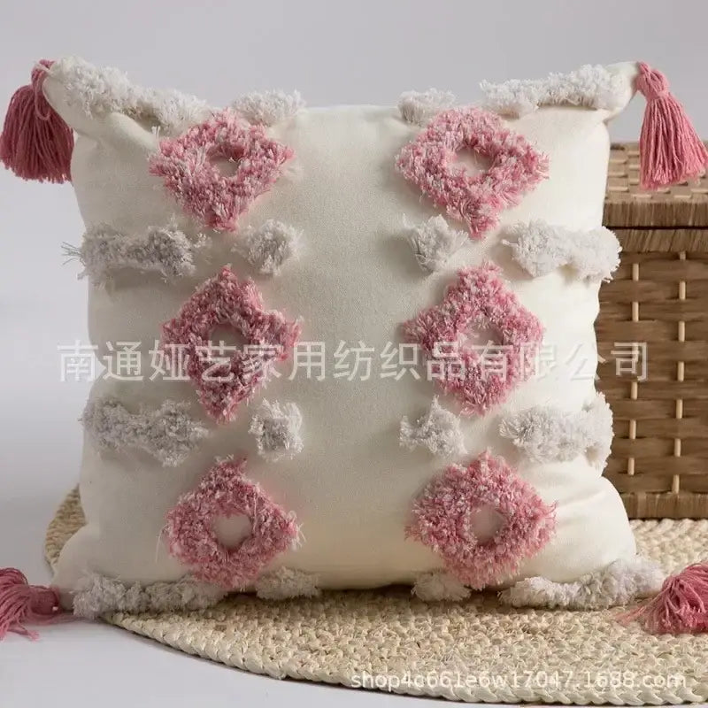 Cream-colored geometric tufted tassel cushion cover with pink and white diamond patterns for beige and gray decorbites decor