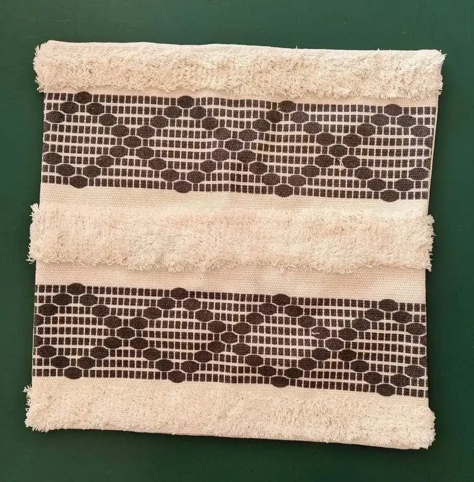 Beige cushion cover with frayed edges and dark brown geometric tufted tassel bands for decorbites geometric decorbites geometric tufted tassel decor