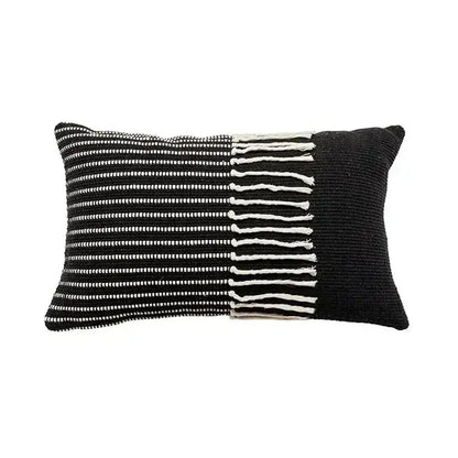 Black and white woven rectangular cushion cover with textured knit pattern featuring decorbites geometric tufted tassel design