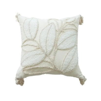 Cream-colored geometric tufted tassel cushion cover with textured leaf embroidery and tassels for living room decor