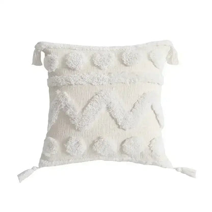 Cream-colored textured cushion cover with geometric tufted tassel design and fluffy pom-poms for living room decorbites decor