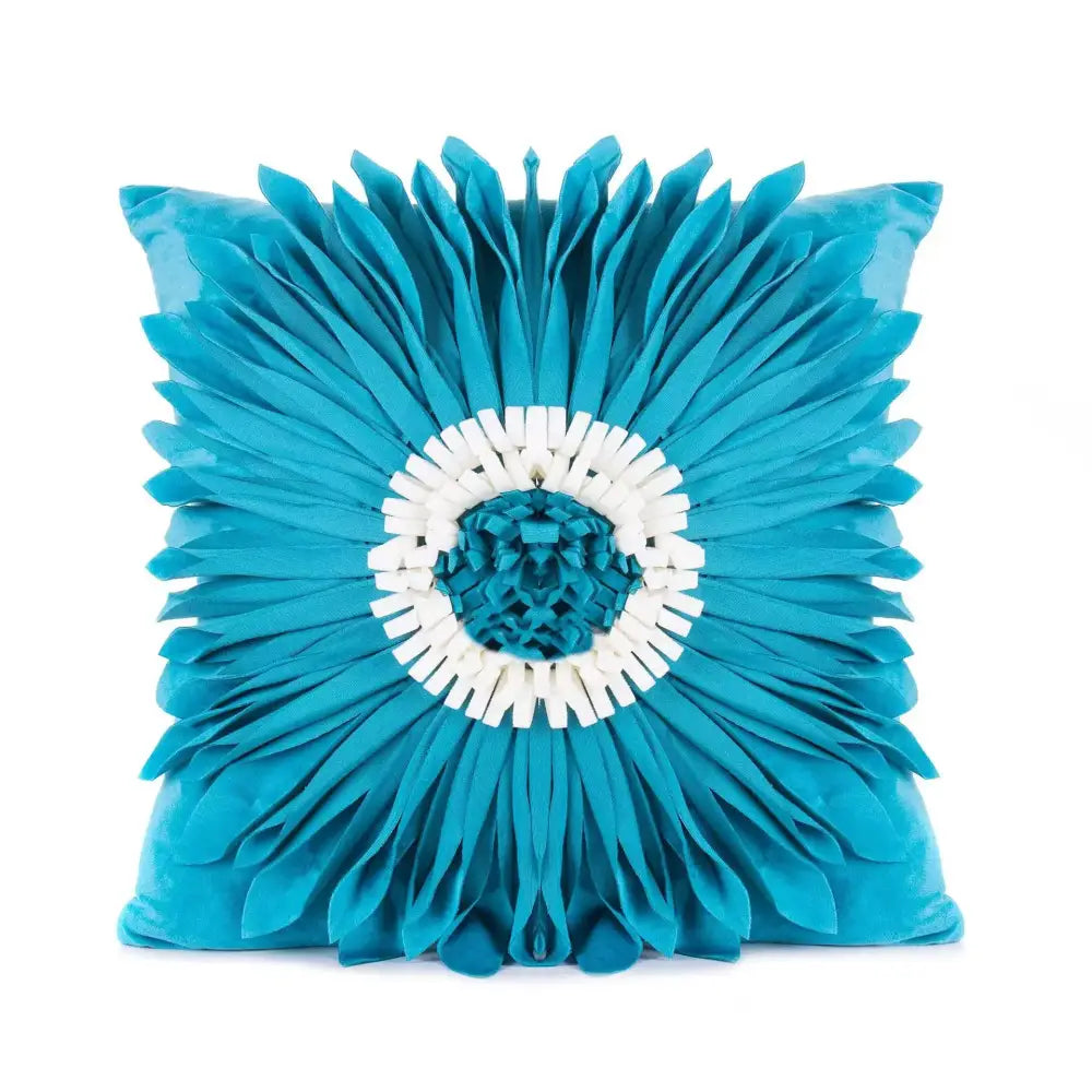 Vibrant turquoise velvet cushion cover with geometric tufted tassel design and three-dimensional floral decorbites accent